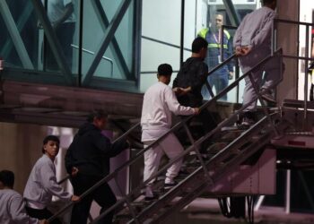 Venezuela dice que 35 de los migrantes que retornaron el viernes estaban en Guantánamo