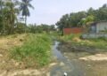 Voz Comunitaria | Residentes de El Esfuerzo II viven entre un río de aguas negras